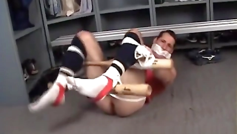 Sexy young blonde girl with a toy in her legs and i